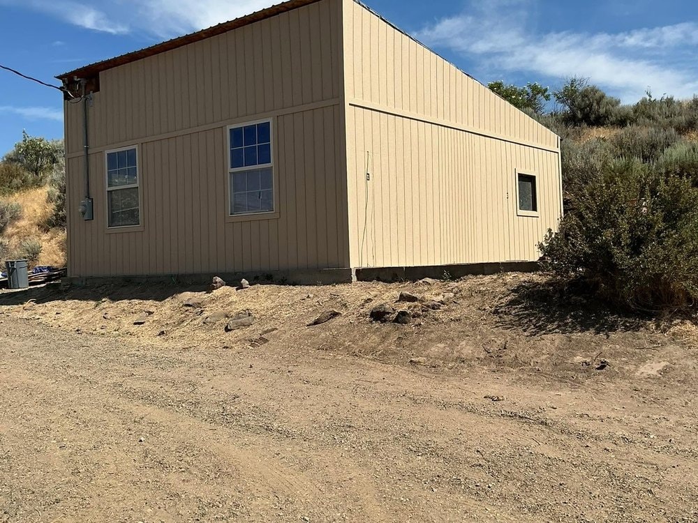 The completed garage seen from the drive